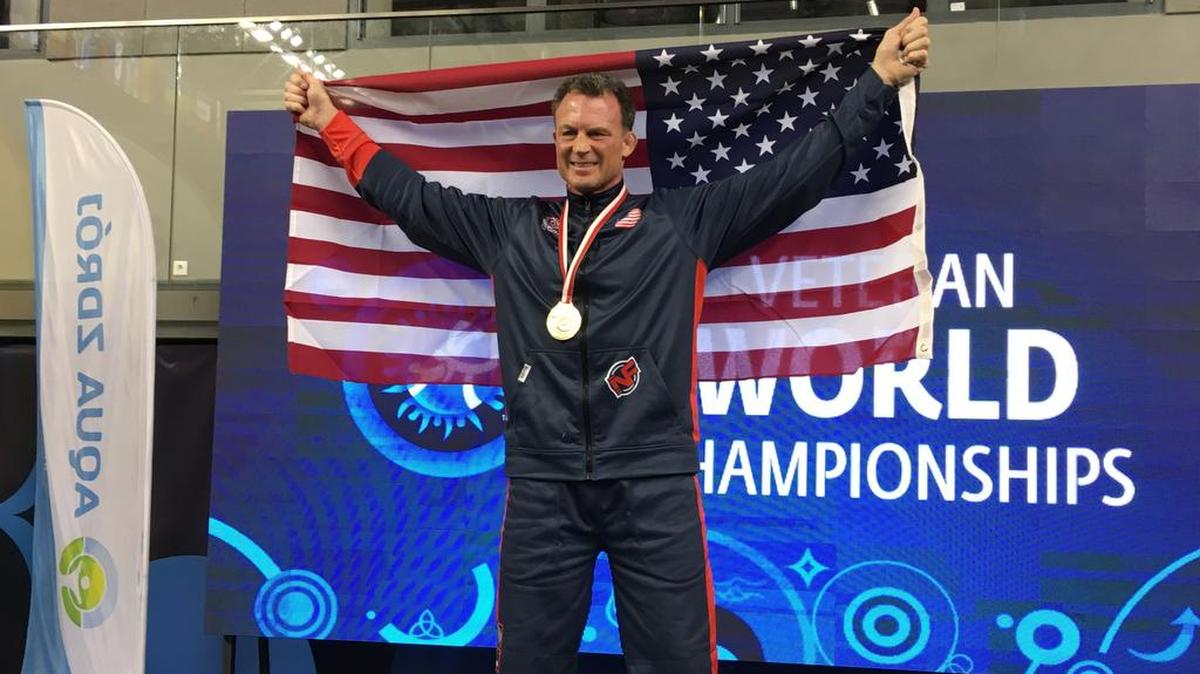 Former Penn State wrestler John Hanrahan celebrates on the podium after winning the 85-kilogram weight class of the Freestyle Veteran’s Category E World Championships in Poland back in 2016.