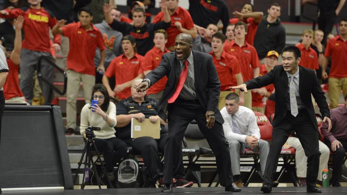 Maryland head coach and former Penn State heavyweight Kerry McCoy, left, will coach his first dual inside Rec Hall on Sunday when the Terrapins visit the Nittany Lions at 2 p.m.