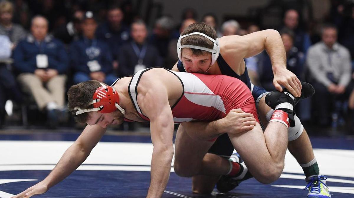 Penn State’s Zain Retherford wrestles Indiana’s Davey Tunon at 149 pounds during a match Sunday, Dec. 17, 2017 at Rec Hall.