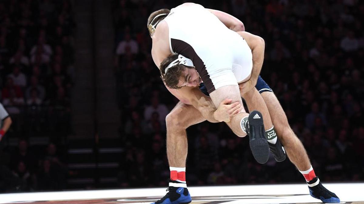 Penn State’s Anthony Cassar (left) takes down Lehigh’s Jake Jakobsen at 197 pounds during Sunday’s match against the Mountain Hawks in Allentown. Cassar defeated Jakobsen 8-3. Penn State defeated Lehigh 23-19.