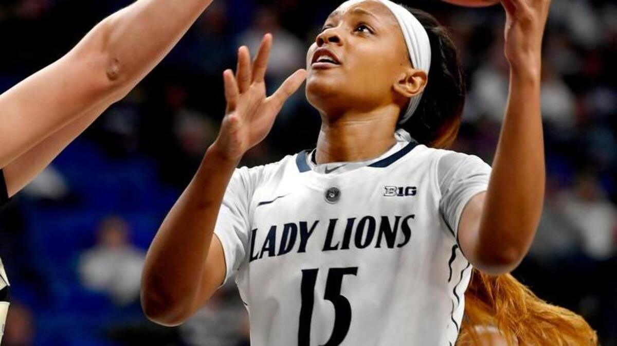 Penn State senior Kaliyah Mitchell goes in for a basket around a Purdue defender during Saturday’s game at the Bryce Jordan Center.