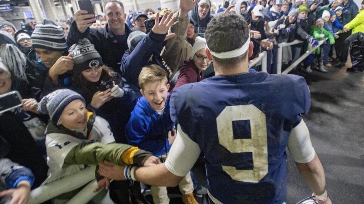 Penn State quarterback Trace McSorley high fives fans after walking playing on the field at Beaver Stadium for the last time with a win over Maryland on Nov. 24. He’ll try to go out a winner against Kentucky on Jan. 1 in the Citrus Bowl — but it won’t be easy.