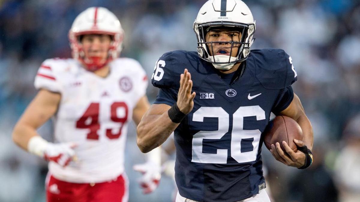 Penn State running back Saquon Barkley (26), running for a touchdown against Nebraska on Nov. 18, said he has not yet decided on his football future as the Nittany Lions prepare to meet Washington in Saturday’s Fiesta Bowl.