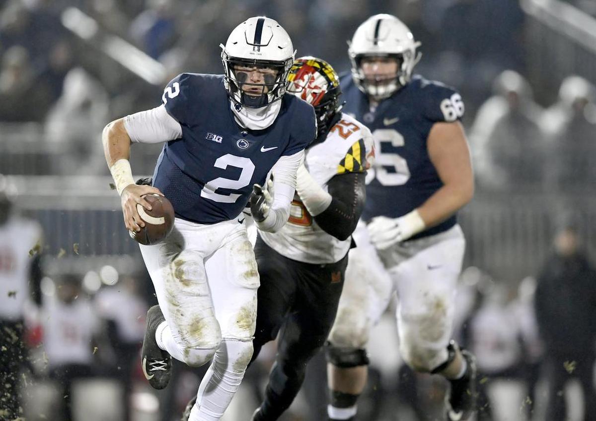 Penn State lion Tommy Stevens runs with the ball during the game against Maryland on Saturday, Nov. 24, 2018.