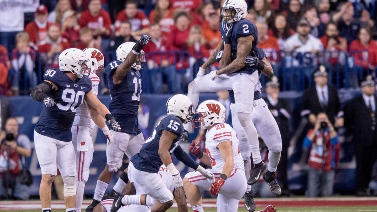 The Penn State defensive line celebrates stopping Wisconsin's last drive of the game during the Big Ten Championship game on Dec. at Lucas Oil Stadium in Indianapolis, Ind, raging back from 21 points down to beat the Badgers 38-31.