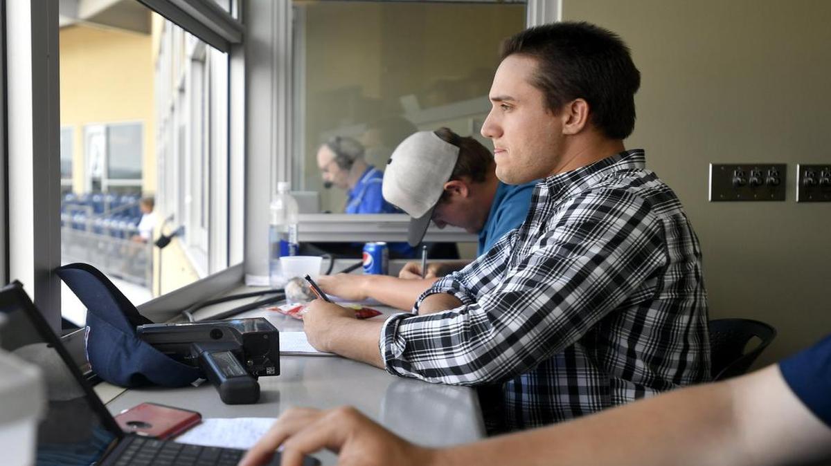 State College Area High School alum and current Auburn Doubledays pitcher Nick Raquet charts pitches during the game against the State College Spikes at Medlar Field at Lubrano Park on Saturday.