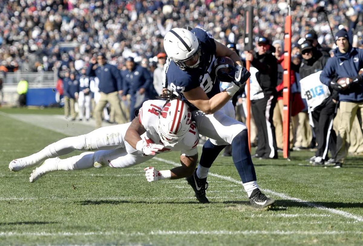 Wisconsin’s D’Cota Dixon knocks Penn State tight end Pat Freiermuth out of bounds just short of the end zone during the game on Saturday, Nov. 10, 2018.