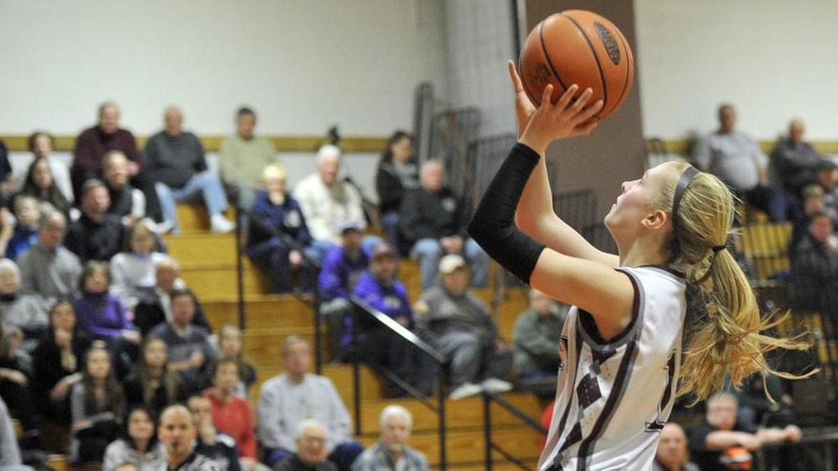 State College's Kayla Hawbaker (1) breaks away for a layup during the Lady Little Lions’ 59-58 loss to the Lady Indians on Friday, March 4, at Tyrone High School.