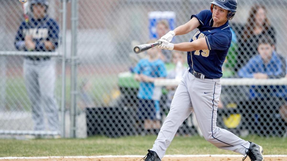 Bald Eagle Area’s Andy Swabick hits a double to center field that scores two runs during the Thursday, April 21, 2016, game against Penns Valley.