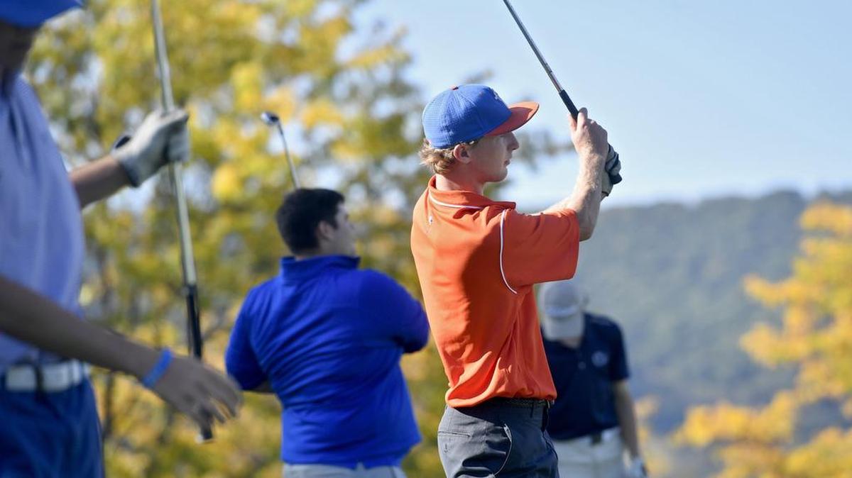 Jack Mangene watches his ball during Saint Joseph’s Catholic Academy golf team practice at Mountain View Country Club on Tuesday.