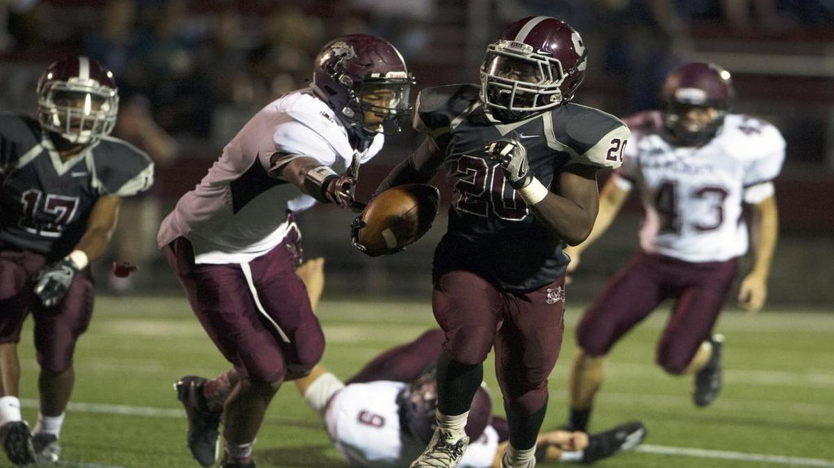 State College running back Tristen Lyons runs with the ball toward the end zone during a game against Mechanicsburg last season. He’ll hope for a similar performance again Friday, when the two teams meet again.