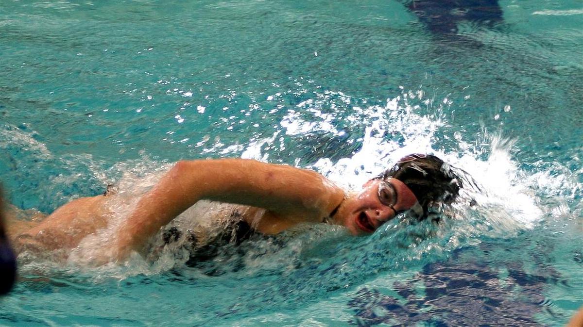 State College’s Colleen Adams swims during the New Year’s Challenge at Bucknell on Saturday.