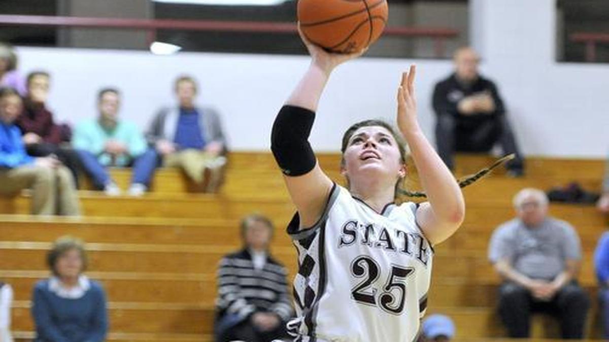 State College's Kyla Irwin (25) jumps for a shot in front of Northampton's Jade Rindock (14) players during the Kiwanis Holiday Basketball Classic on December 29, 2015.