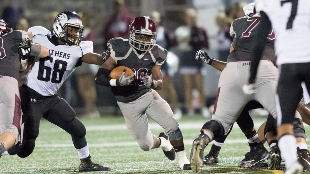 State College's Triston Lyons runs the ball during the first quarter against Central Dauphin East. The Little Lions won 34-14.