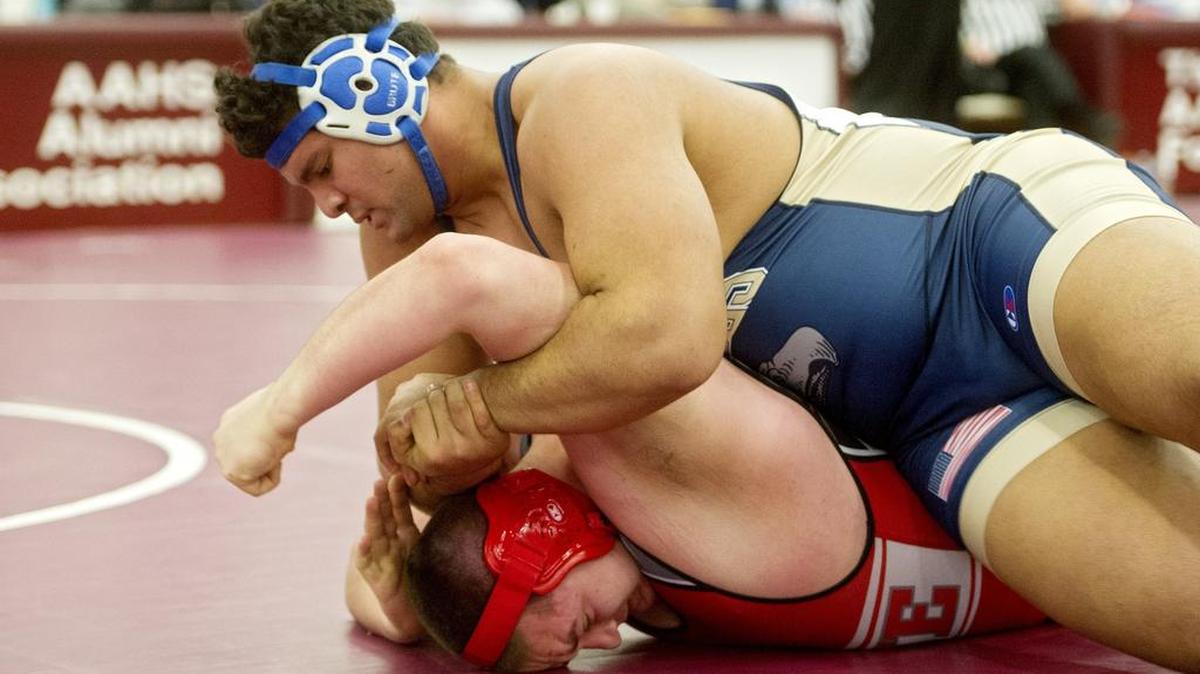 Bald Eagle Area’s Josh Fye, on top, won the 285-pound PIAA Northwestern Regional championship on Saturday. controls General McLane’s Jacob Lenhardt in a 285 pound bout during the PIAA Northwestern Regional wrestling tournament at the Altoona Field House on Friday, March 4, 2016.