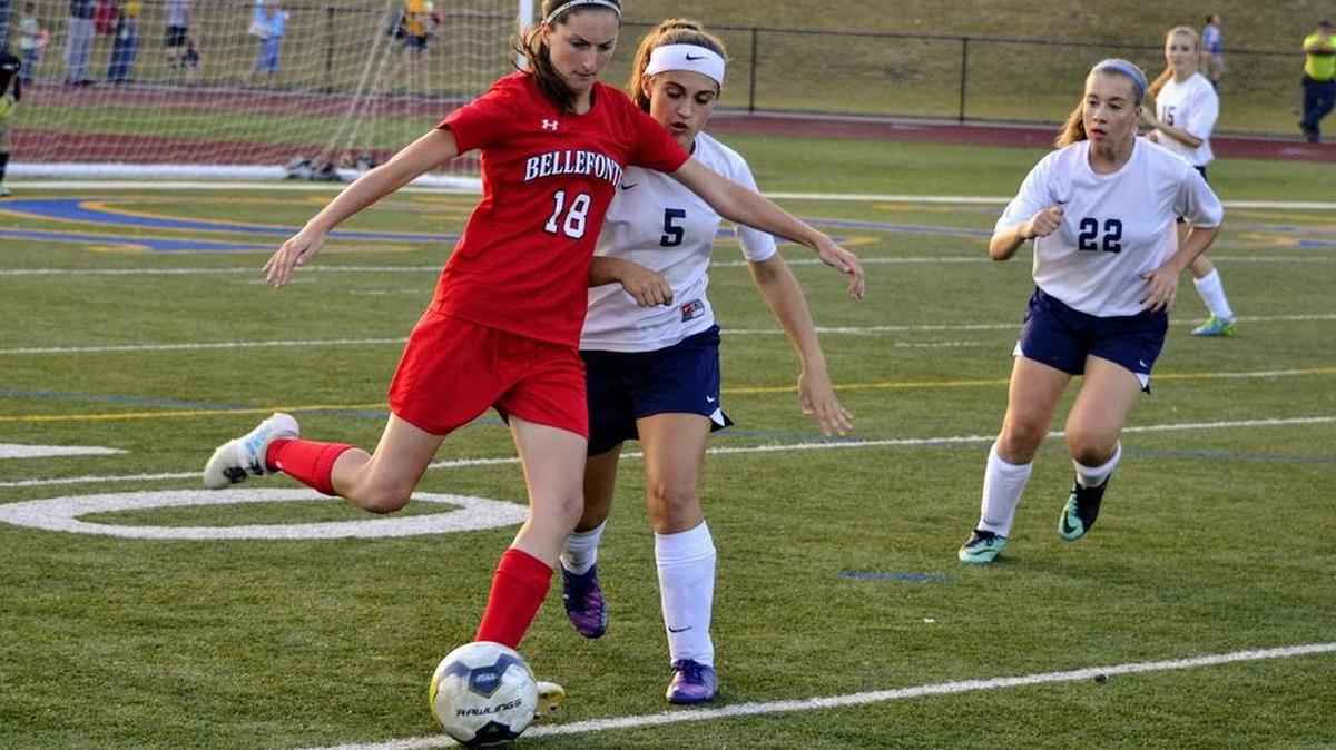 Bellefonte’s Lynnsey Kauffman (18) prepares to boot the ball away from Bald Eagle Area defender Madison Jones (5) and Allison Cowan on Monday at Alumni Stadium in Wingate. The Lady Red Raiders won 2-0.