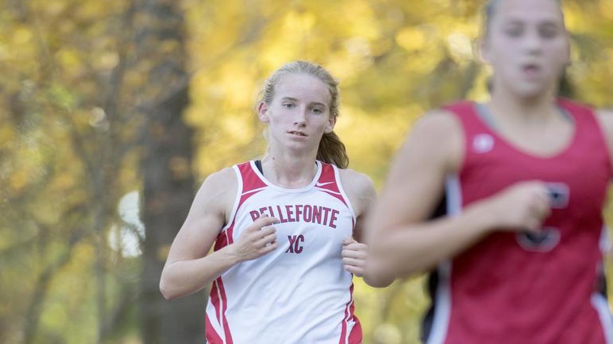 Bellefonte's Amber Shirey races through the woods during the Mountain League cross county championships at Penns Valley in 2016. Shirley finished in fourth with a time of 21.12.