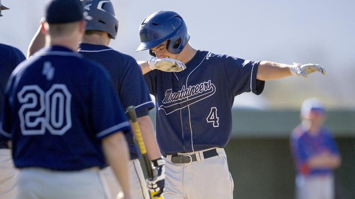 Philipsburg-Osceola’s Logan Williamson celebrates as he steps on home plate after his home run off of the foul post during Wednesday’s win against Saint Joseph’s.