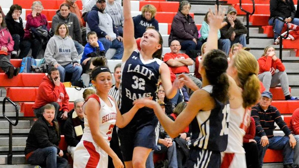 Penns Valley's Jordan Andrus (32) layup gives the Lady Rams another basket against the Bellefonte Lady Red Raiders.