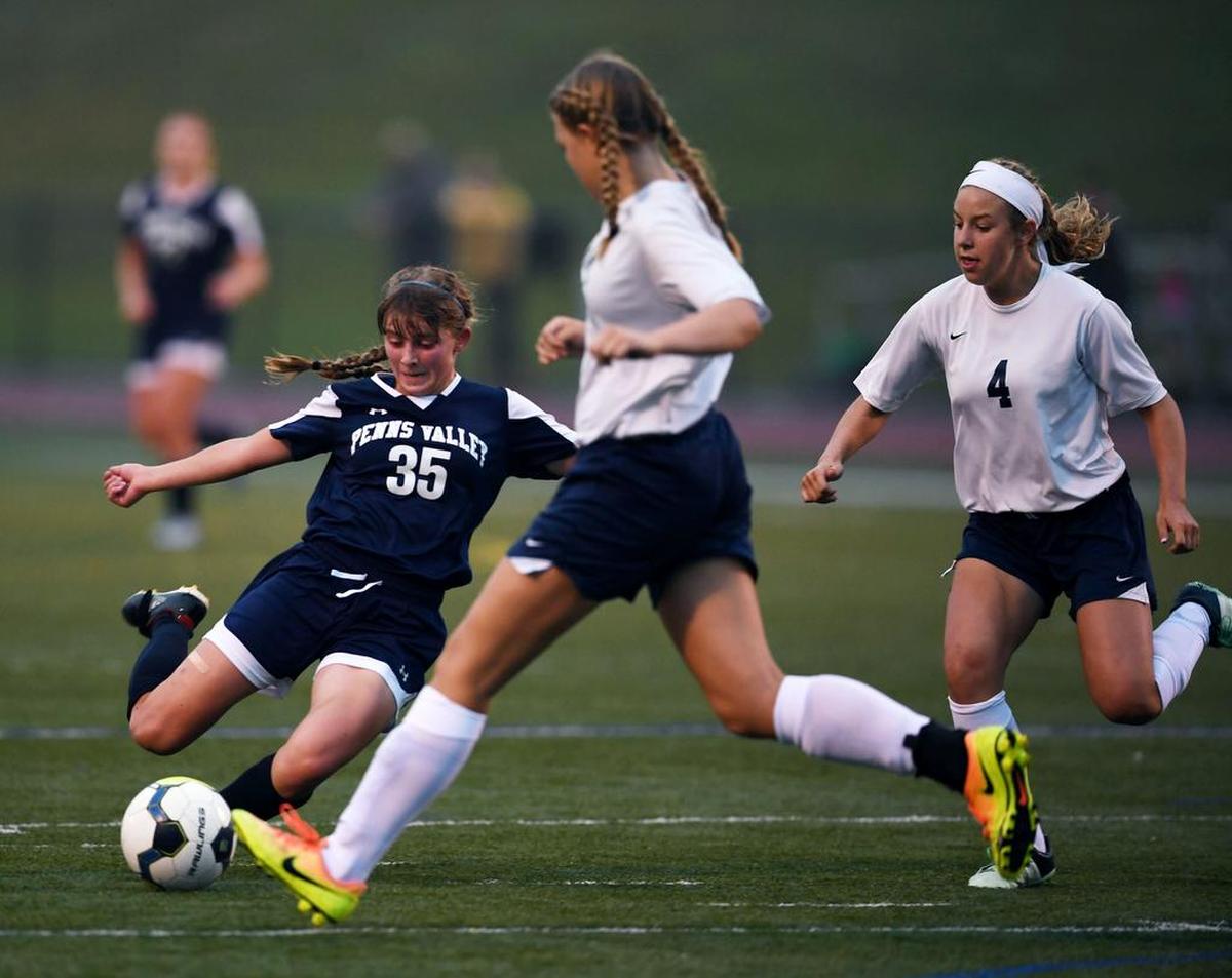 Penns Valley midfielder Maria Lovallo, left, goes to kick the ball during a game against Bald Eagle Tuesday, Sept. 5, 2017 at Bald Eagle Area High School.