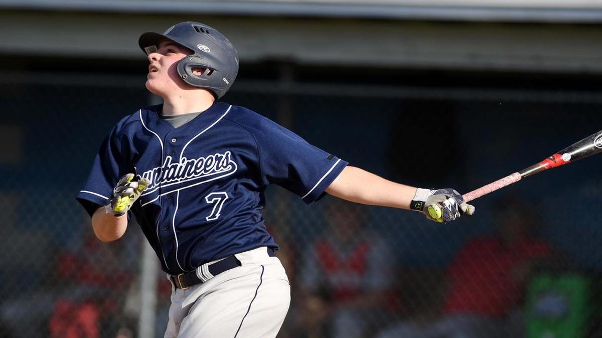 Philipsburg-Osceola's Keegan Soltis looks up at the ball after hitting a double during a game against Central on April 10.
