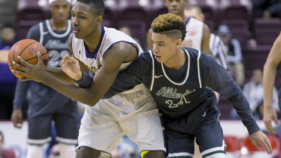 Penn State basketball commit Tony Carr, left, repeated as the Class AAAA Player of the Year.
