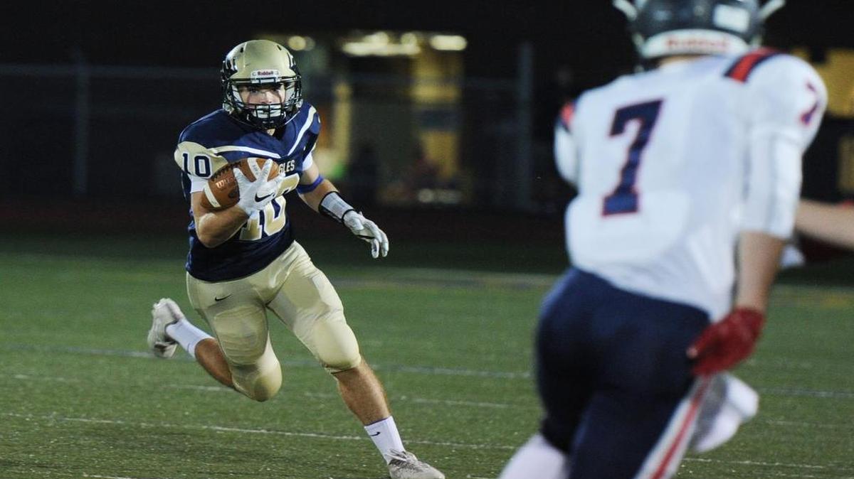 Bald Eagle Area wide receiver Matthew Reese runs the ball down the field during a game against Huntingdon Friday Oct. 6, 2017 at Bald Eagle Area High School.
