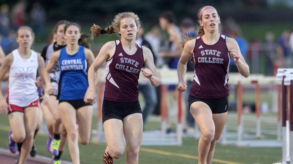 State College’s Esther Seeland, right, finished first in the 800-meter run Saturday at the Kevin Dare High School Invitational.
