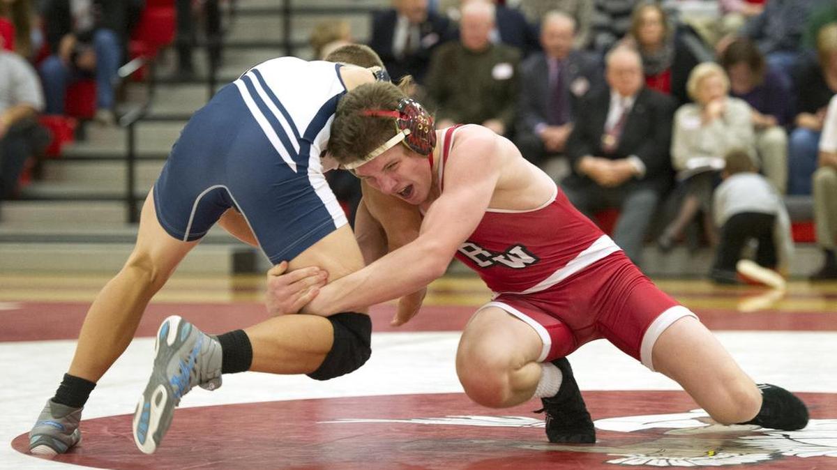 Bellefonte's Brock Port scores a takedown on Philipsburg-Osceola's Levi Hughes during a wrestling match on Tuesday, Dec. 8, 2015.