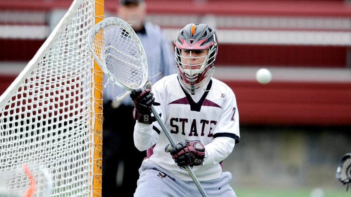 State College's Noah Schwab defends the net during the game against Palmyra on Thursday, April 7, 2016.