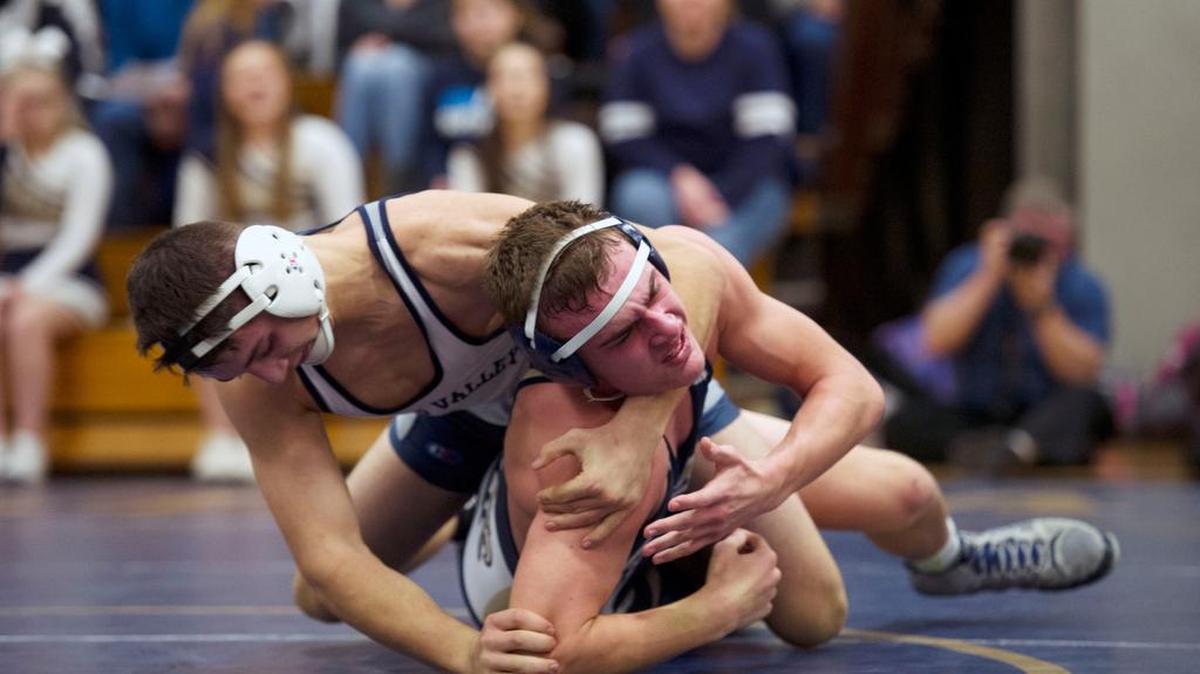 Penns Valley’s Abraham Allebach looks for back points on Bald Eagle Area’s Dylan Bisel during the Eagles’ 35-32 win on Tuesday, Jan 24, 2017 at Bald Eagle Area High School. Allebach won the 170-pound bout 14-2.
