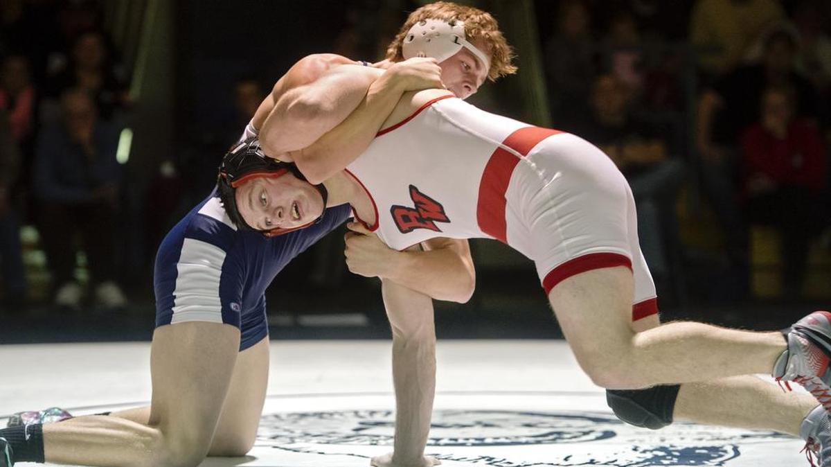 Penns Valley’s Allen Cain grapples with Bellefonte’s Dillon Kephart in the 170 pound bout during Thursday’s match. Kephart won by decision, 3-2.