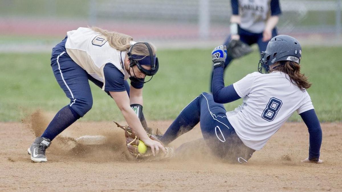 Philipsburg-Osceola’s Maggie Peck safely steals second under the tag from Bald Eagle Area’s Kaleigh Kinley during the Thursday, March 31, 2016 game.