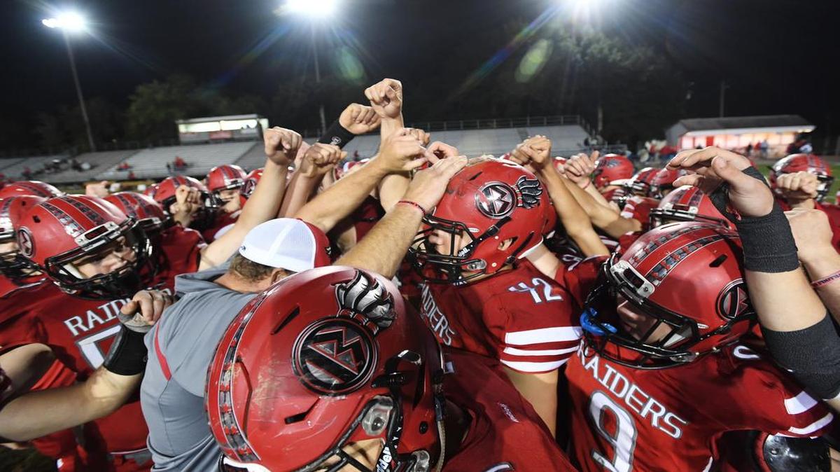 The Bellefonte Red Raiders celebrate their win over Clearfield Friday, Sept. 29, 2017 at Bellefonte Area High School.