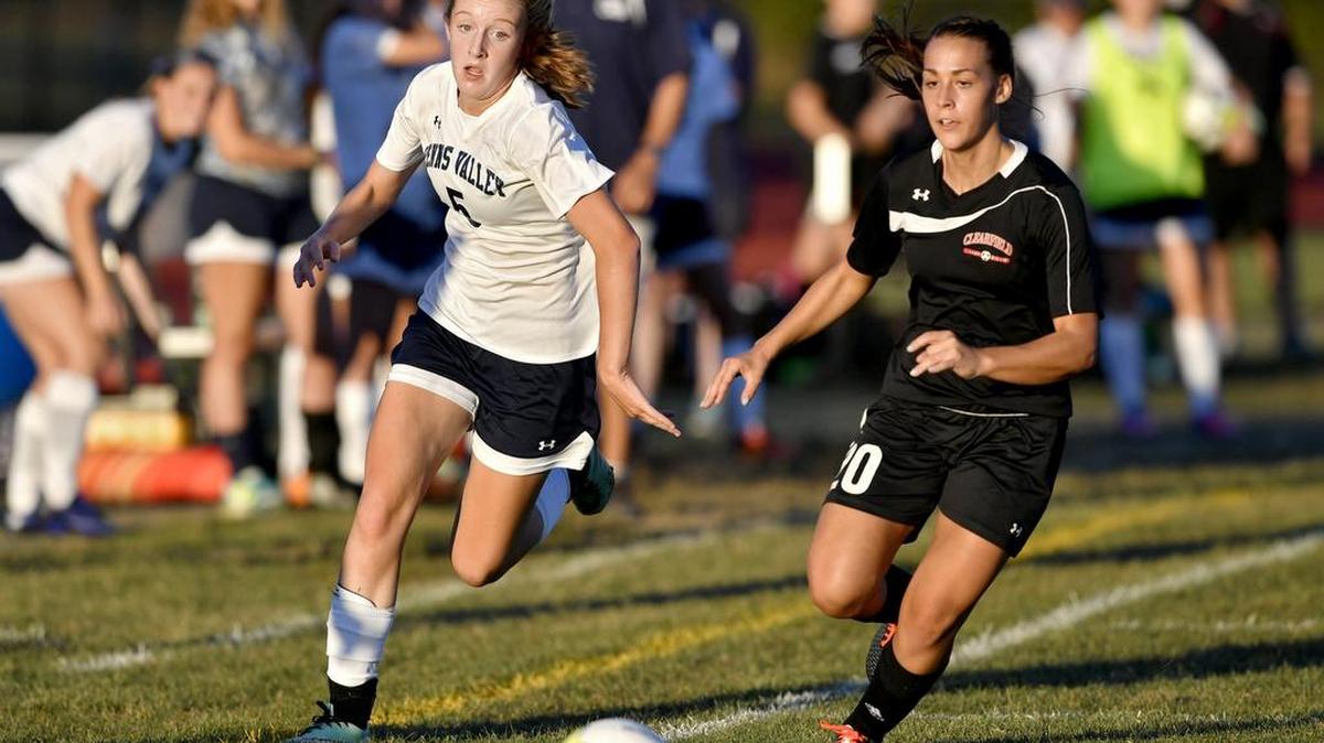 Penns Valley’s Hannah Montminy, left, runs chases the ball with Clearfield’s Shaina McBride during the Lady Rams’ 5-1 win Thursday.