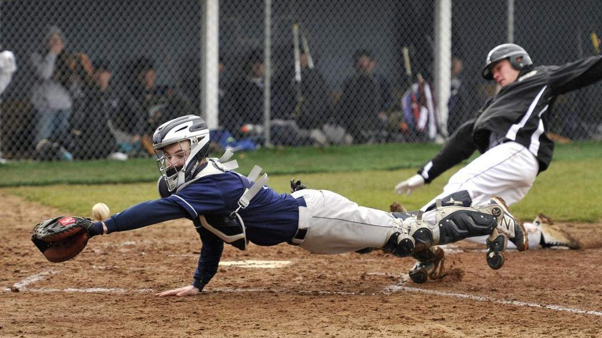 Philipsburg-Osceola’s Derek Shaw, diving for a catch against Curwensville, and the Mounties’ baseball team are enjoying a perfect 7-0 start to their 2016 season.