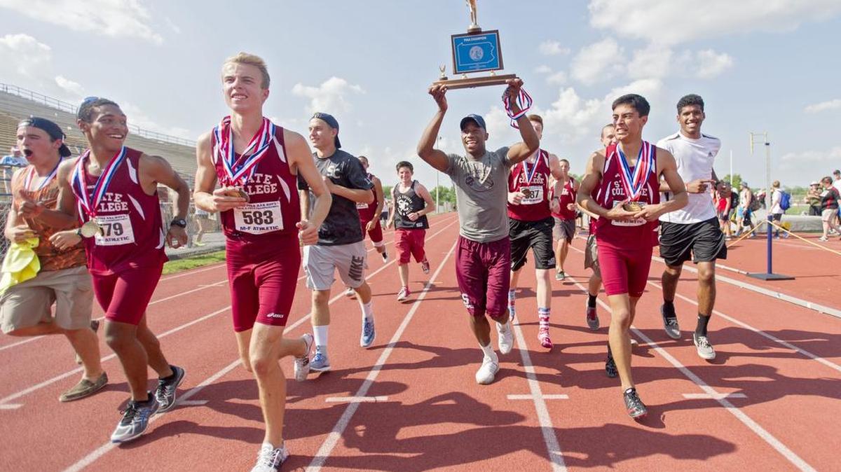 State College boys take a victory lap with their trophy after winning the team title at the PIAA State Track and Field and Championships at Shippensburg University on Saturday, May 28, 2016.