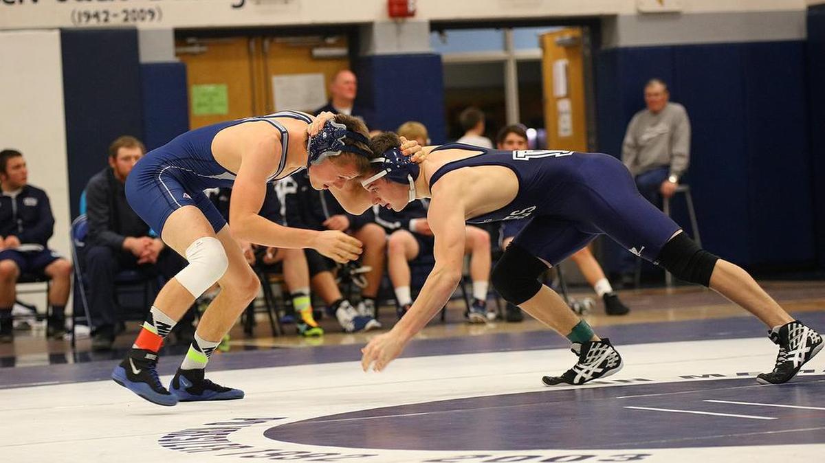 Philipsburg-Osceola’s Nick Patrick, left, goes to grab the foot of Penns Valley’s Jared Hurd at 160 lbs. on Tuesday night at Philipsburg-Osceola High School as the Mounties took on the Rams.