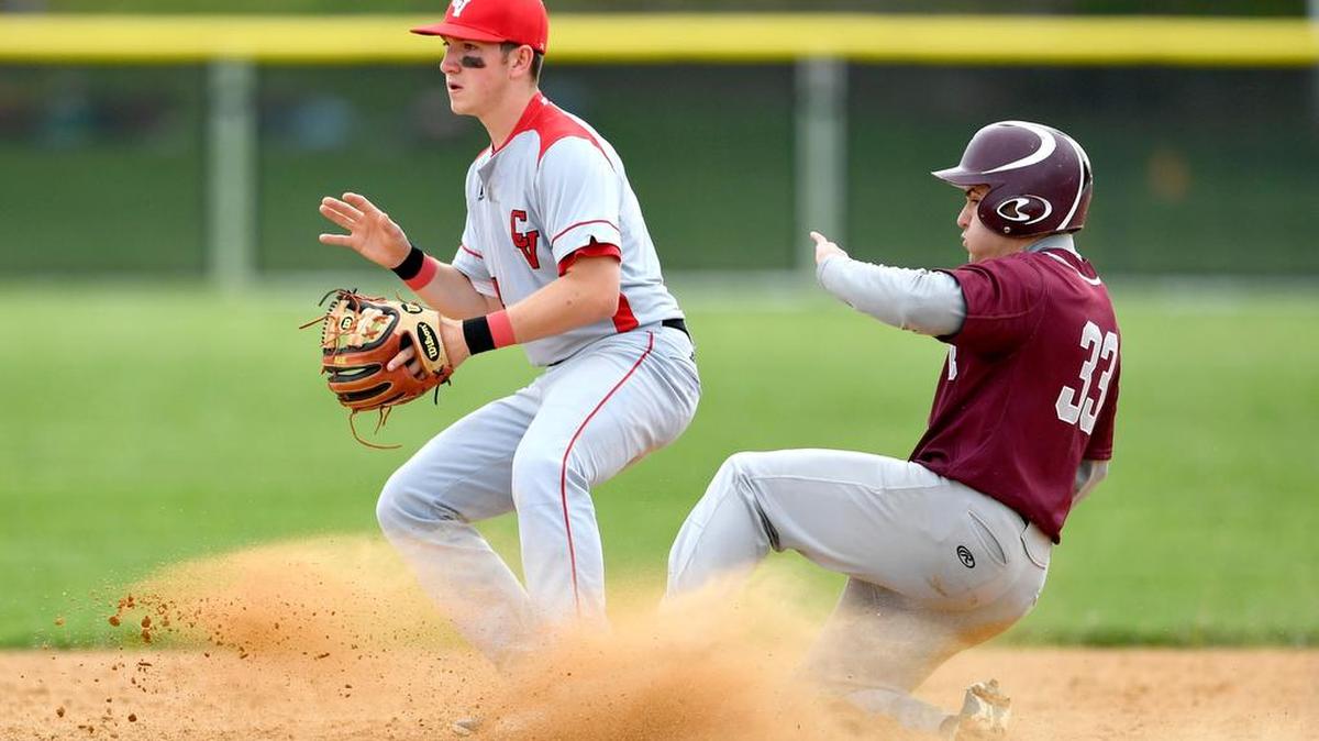 State College's Brandon Raquet safely slides into second base during Tuesday’s game against Cumberland Valley. State College won 5-1.
