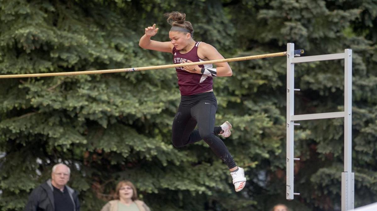 State College’s Lyndsey Reed, seen here a week ago, grabbed gold in the pole vault Saturday before heading off to junior prom. The Lady Little Lions came away with the Mid-Penn championship on Saturday after beating more than 20 other teams.
