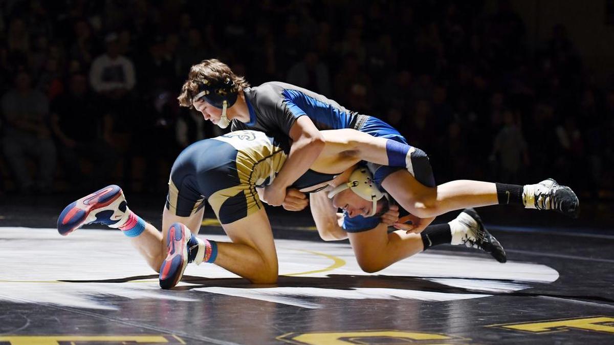 Bald Eagle Area’s Lucas Holderman looks for a takedown on Central Mountain’s Davis Seyler in their 126-pound bout Friday, Dec. 22, 2017 at Bald Eagle Area High School. Holderman pinned Seyler in 1:08 as the Eagles took care of the Wildcats 39-33.