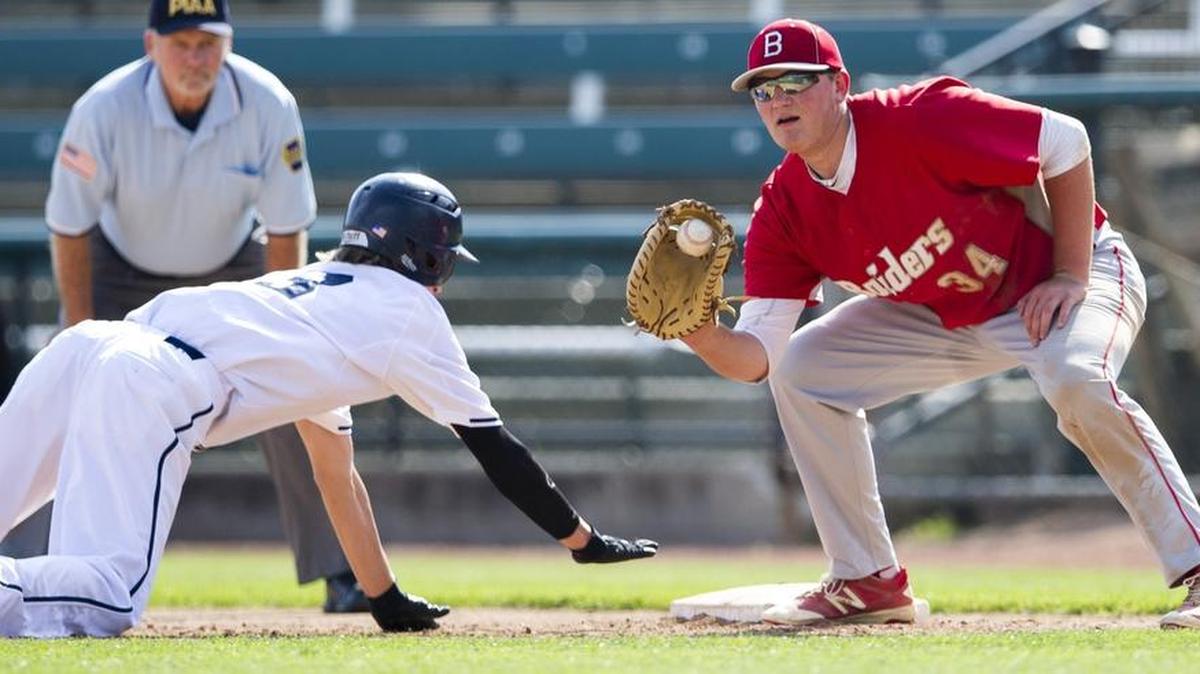 Bellefonte first baseman Logan Mathieu catches a throw from the pitcher after Hollidaysburg left fielder Andrew Moyer slides safely back to base during the District 6 championship game at Peoples Natural Gas Field on Wednesday, June 1, 2016.