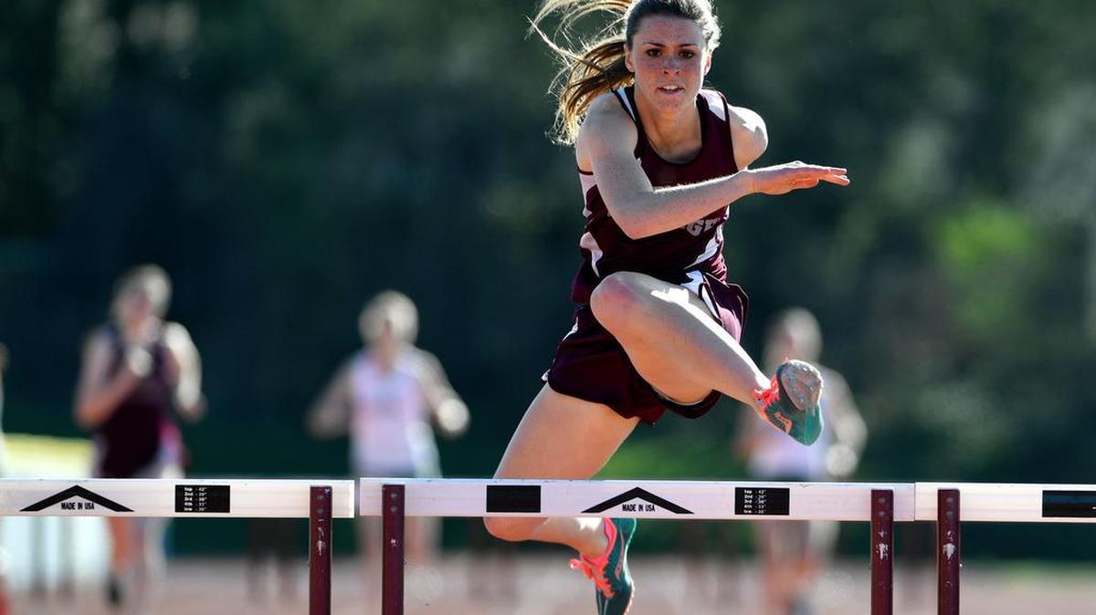 Rachel Wylie wins the girls’ 300-meter hurdles. The State College Area High School girls' and boys' track and field teams faced Carlisle on April 19, 2016.
