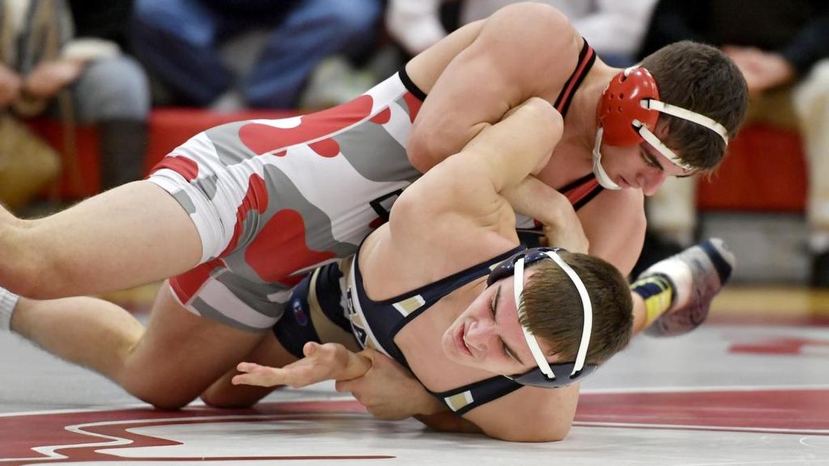 Bellefonte's Lukas McClure controls Bald Eagle ARea's Dylan Bisel in the 170 pound bout during the match on Thursday, January 5, 2017. McClure won by decision, 5-1.