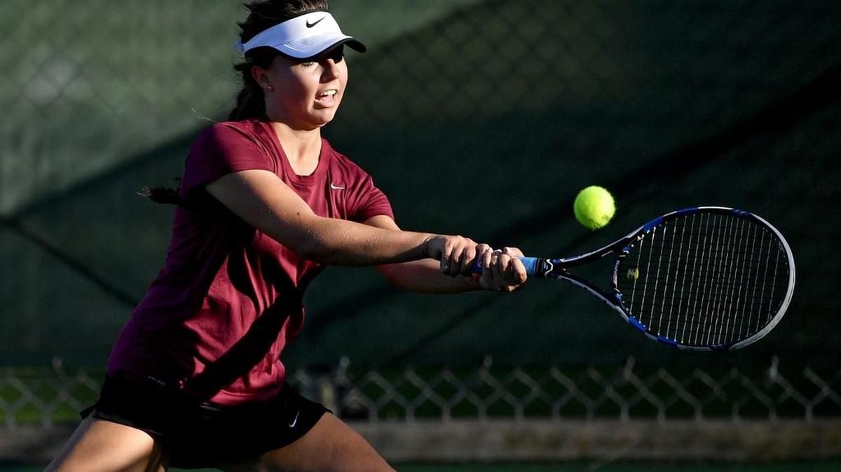 State College's Kelly Vanden returns the ball during her match against Mechanicsburg on Wednesday. State College won 5-0 on senior night.