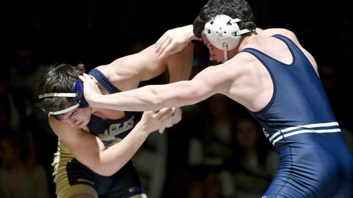 Bald Eagle Area's Gage McClenahan and Philipsburg-Osceola's Matt Johnson grapple in the 152 pound bout on Wednesday, January 17, 2018.