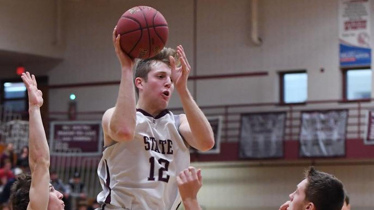 State College’s Drew Friberg passes the ball during a game against Chambersburg Wednesday at State  High.