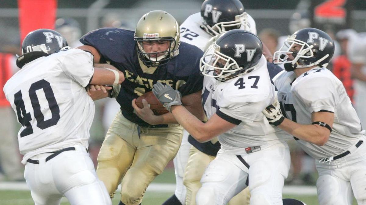 Bald Eagle Area’s A.J. Robinson runs into Penns Valley’s Taylor Wingard (left) and Eric Herrold on Sept. 7, 2007. The Rams won 10-0 in a game that was defined by defense; both teams combined for just 113 total offensive yards.
