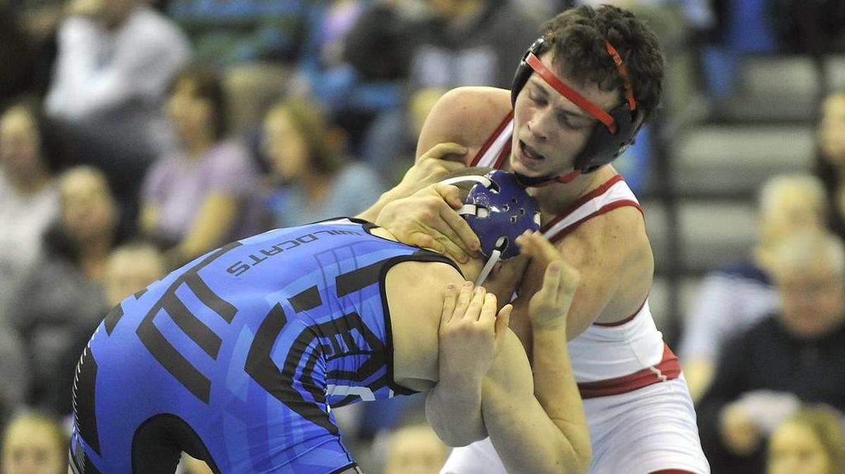 Bellefonte’s Trevor Corl, right, facing Central Mountain’s Brandon Miller in 2015, was named the Mid Atlantic Conference Wrestler of the Week on Monday competing for Lycoming.
