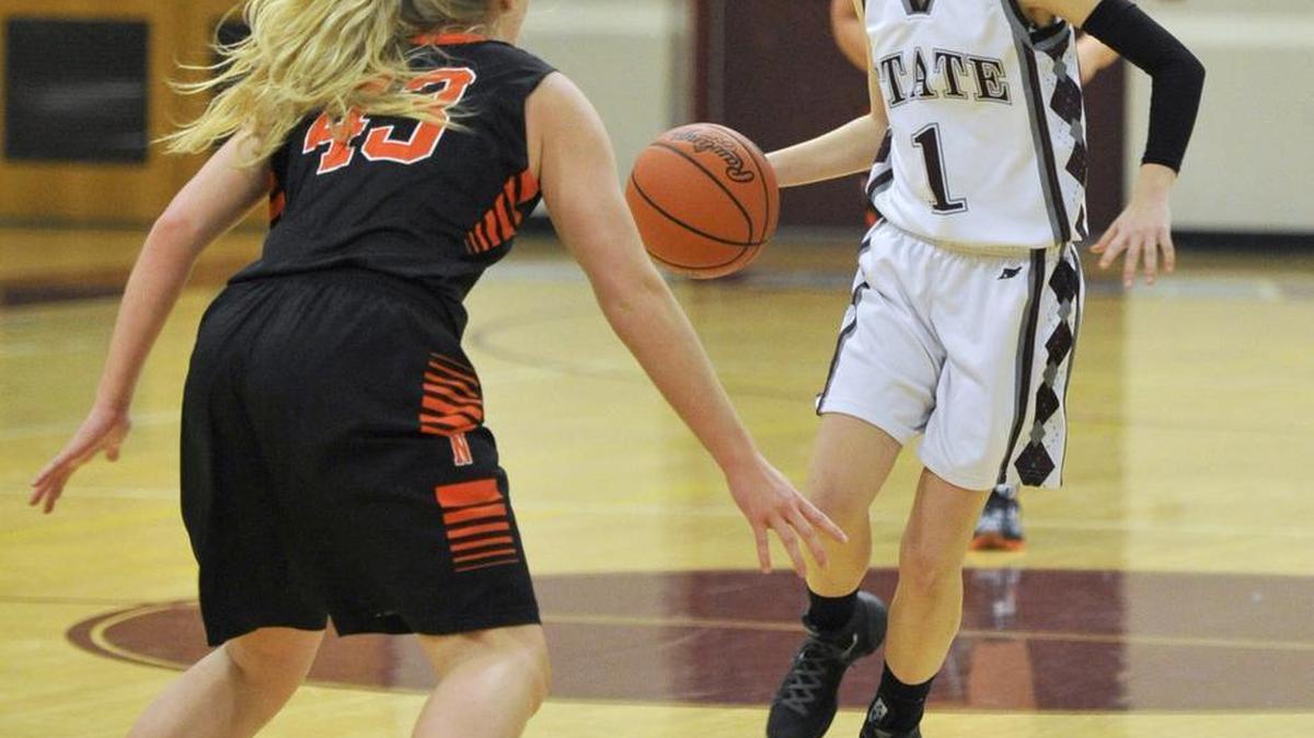 State College’s Kayla Hawbaker (1) dribbles around Northampton’s Sophia Eckroth (43) during the Kiwanis Holiday Basketball Classic on December 29, 2015.